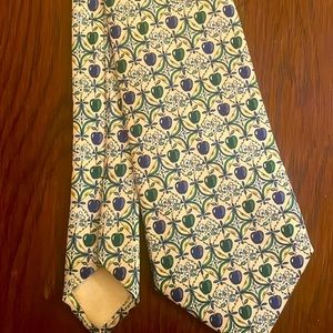 This is an original silk tie made by Hermes.